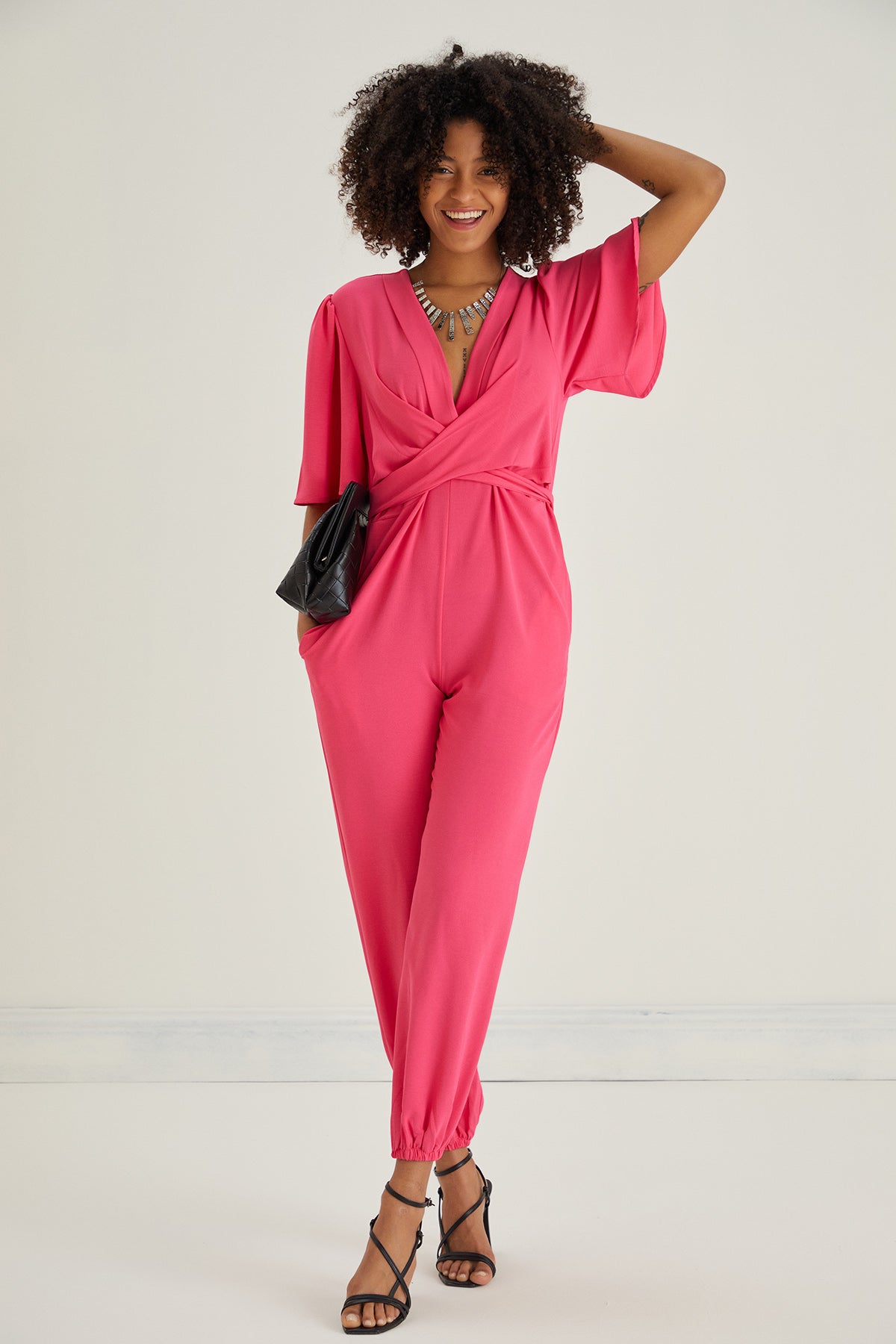 Jessica Angel Sleeve Wrap Jumpsuit in Pink