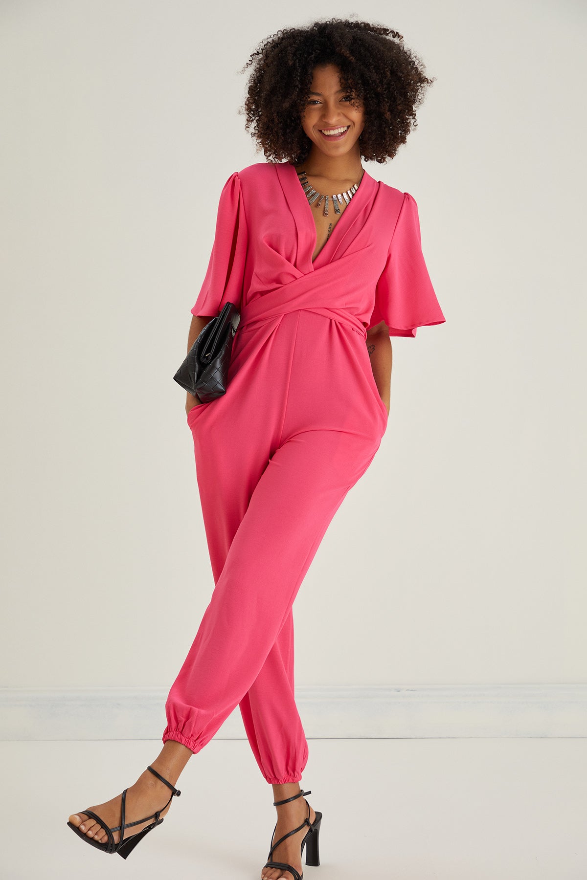 Jessica Angel Sleeve Wrap Jumpsuit in Pink